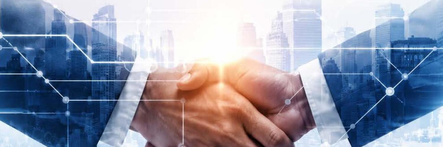 Business partners shaking hands